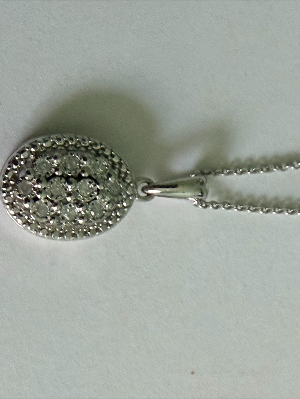 Sterling Silver and Diamond (1/10 ct) Oval Pavé Pendant Necklace